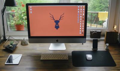 work desk with  desktop computer